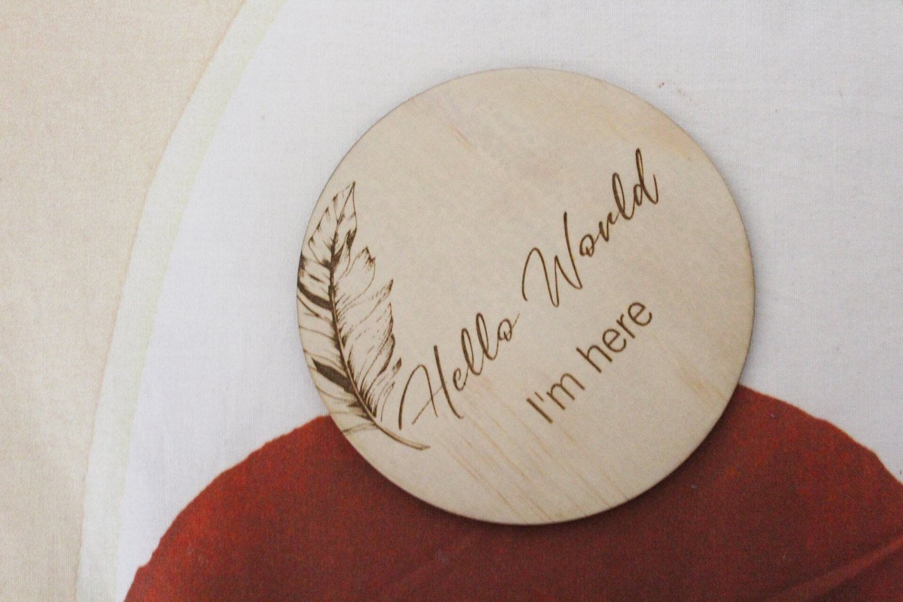 “ Hello World, I’m here” raw wooden disc